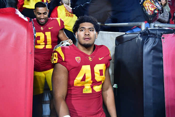 Nov 11, 2022; Los Angeles, California, USA; Southern California Trojans defensive lineman Tuli Tuipulotu (49) following the victory against the Colorado Buffaloes at the Los Angeles Memorial Coliseum. Mandatory Credit: Gary A. Vasquez-USA TODAY Sports